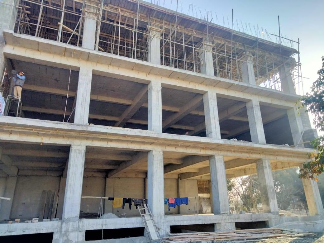 Construction of a commercial plaza by Kamboh Enterprises.