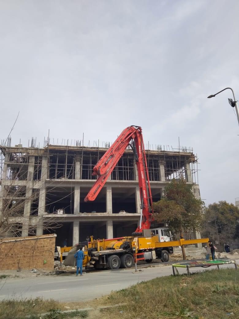 Construction of a commercial plaza by Kamboh Enterprises.